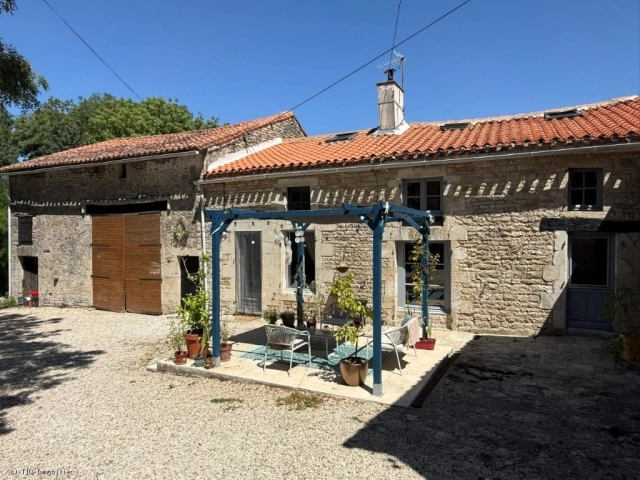 Charming Stone House with Successful Gîte Business, Barn and Enclosed Garden Near Mansle for sale for 159,575&euro; in Charente, Poitou-Charentes